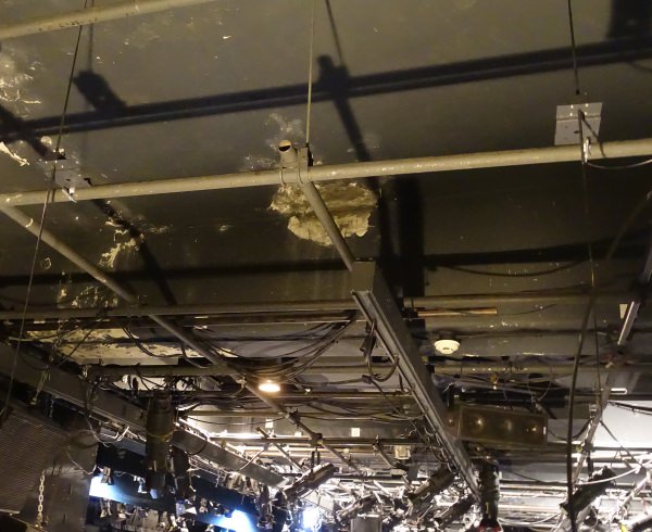 a trade show environment with the presenter and group