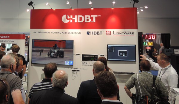 a trade show environment with the presenter and group